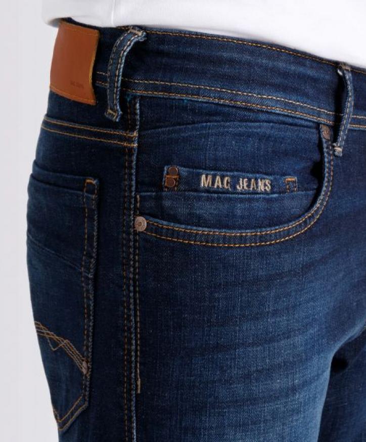 Dark vintage wash detalj 