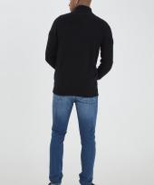 Ryggen av svart cardigan i 100% bomull