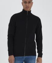 Svart cardigan med dragkedja fast på modell 
