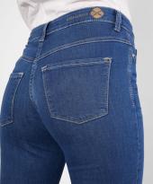 Blå skinny jeans bak